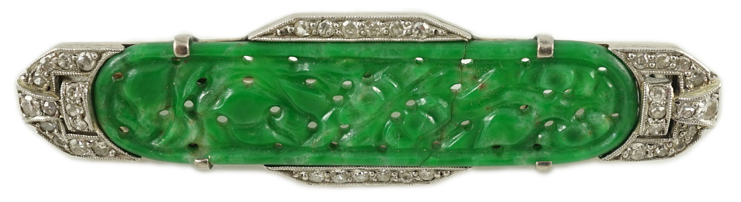 An Art Deco white gold, jadeite and diamond set bar brooch